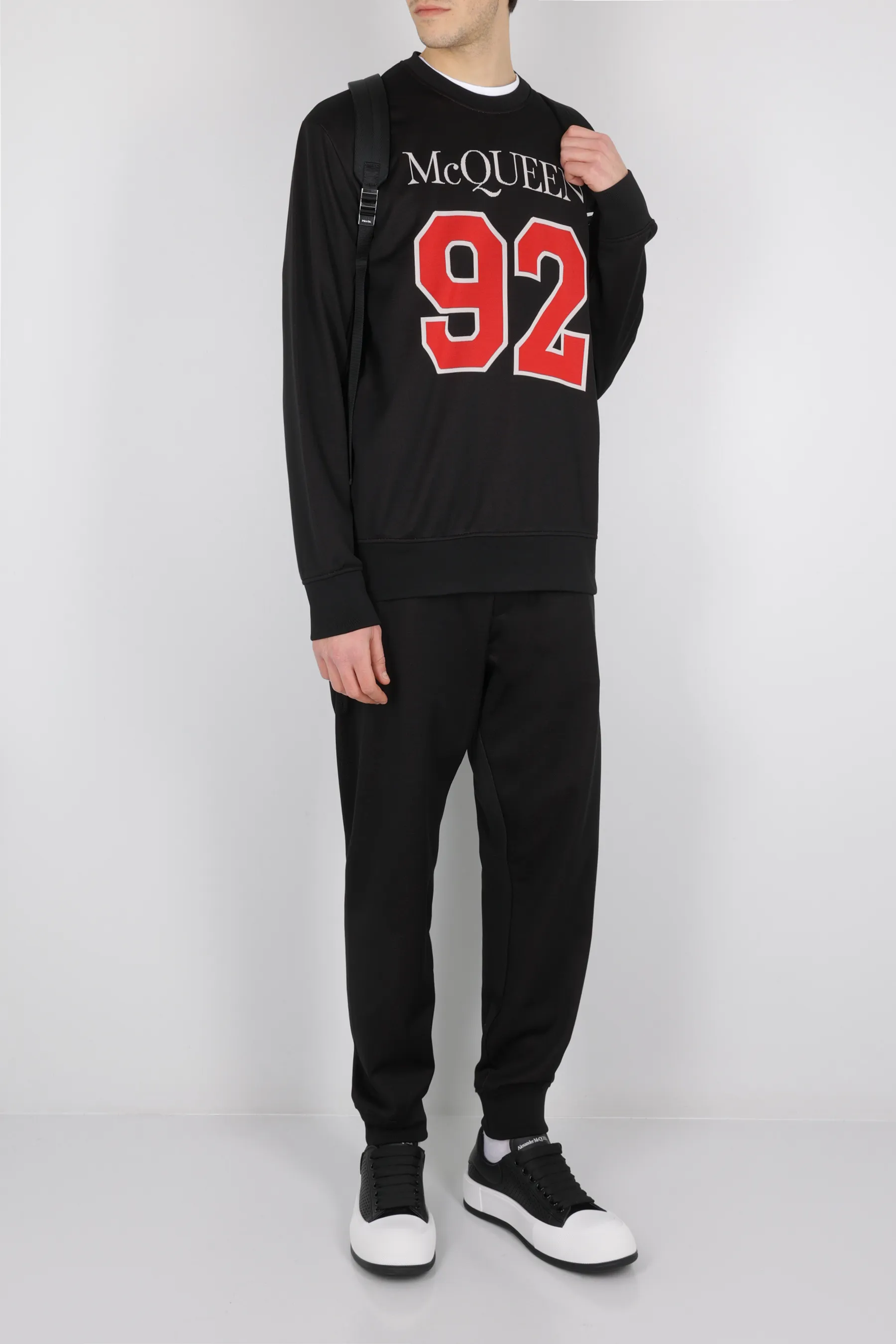  ALEXANDER McQUEEN pantalone jogging in rete jersey con intarsio logo McQueen 92 