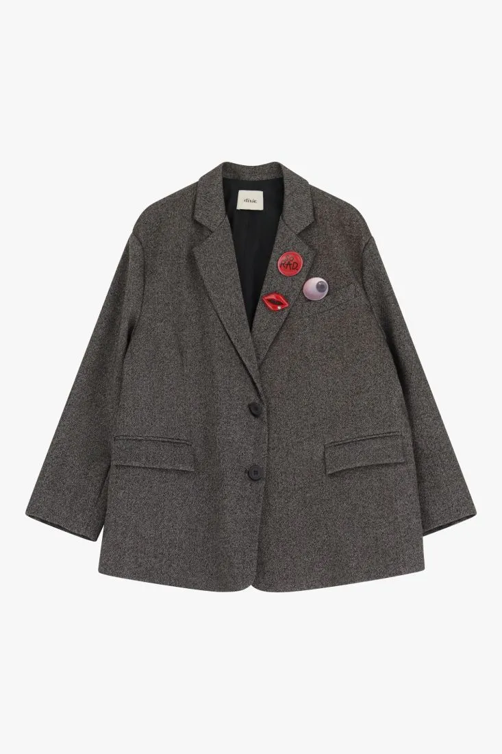  Oversized blazer with decorative brooches    