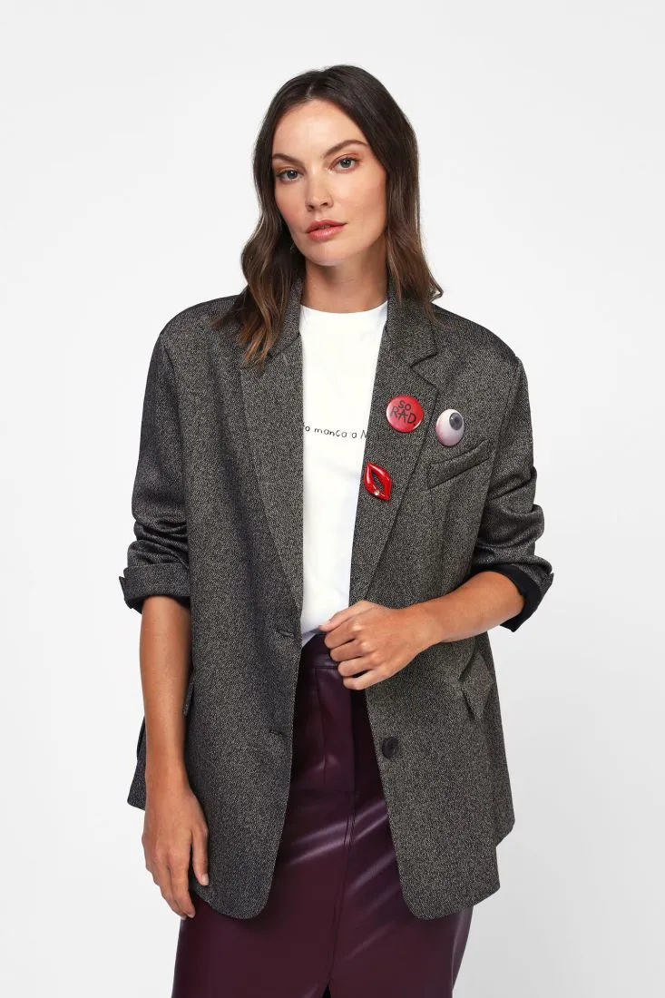  Oversized blazer with decorative brooches    